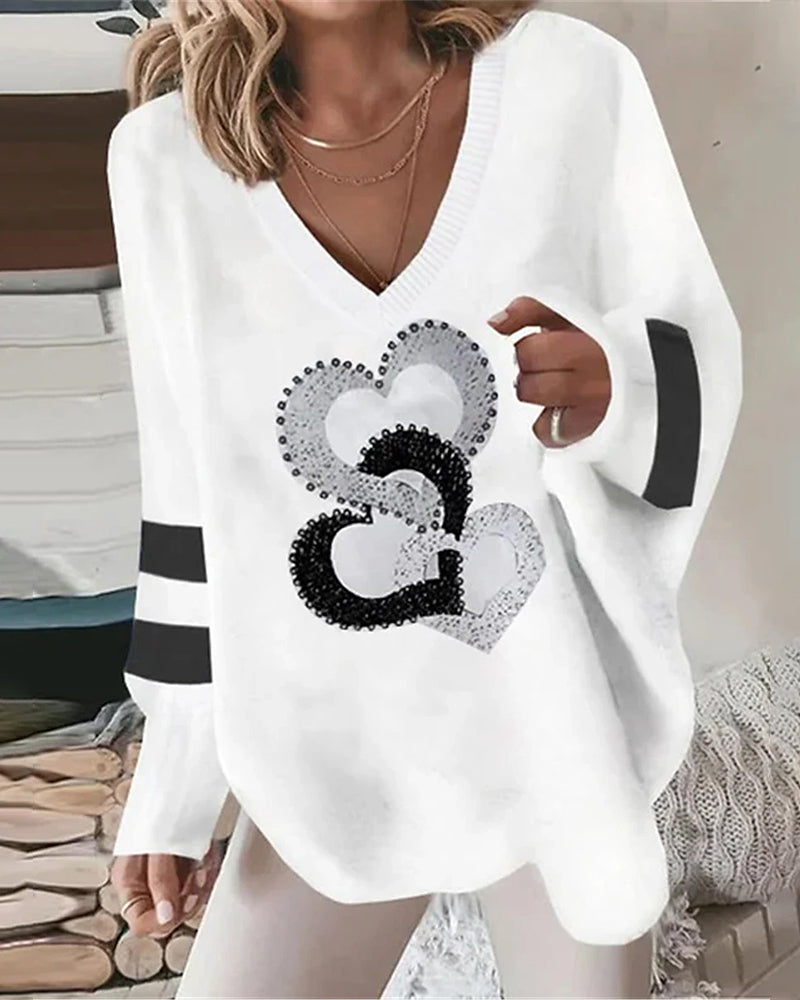 Lyra | Women's V-Neck Oversized Heart Print Sweater - Image 1