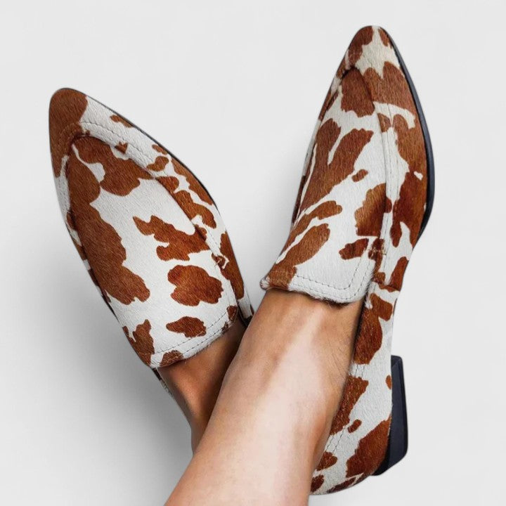Seraphima | Women's Cow Print Slip-On Loafers - Brown - Image 1